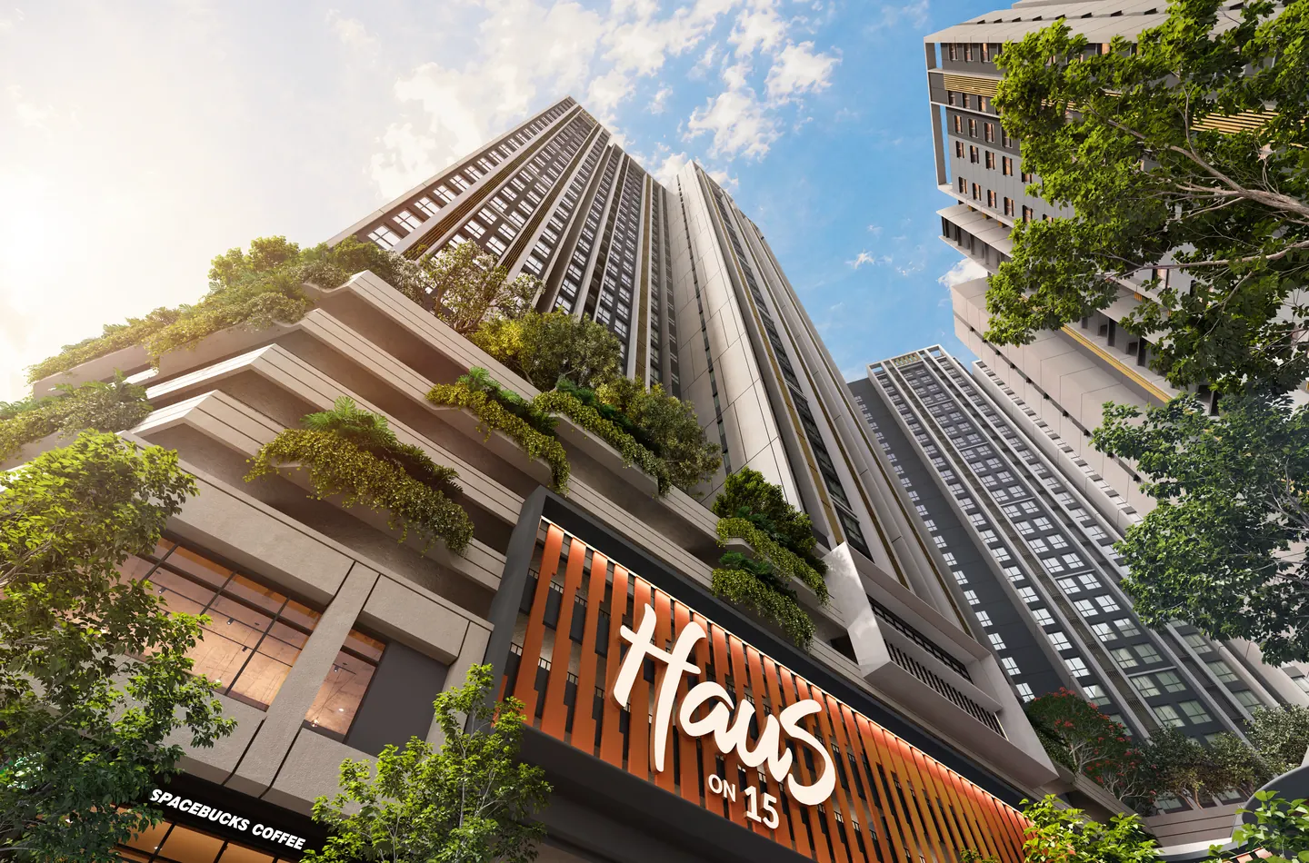 从街道往上看：绿化露台、印着 Haus On 15 的橙色格栅，再往上是塔楼。